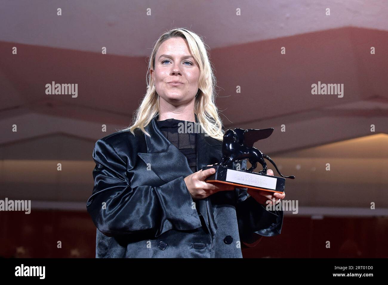 Venice, Italy. 09th Sep, 2023. VENICE, ITALY - SEPTEMBER 09: Mika Gustafson poses with the Best Director Award for film 'Paradise Is Burning' at the winner's photocall at the 80th Venice International Film Festival on September 09, 2023 in Venice, Italy. Credit: dpa/Alamy Live News Stock Photo