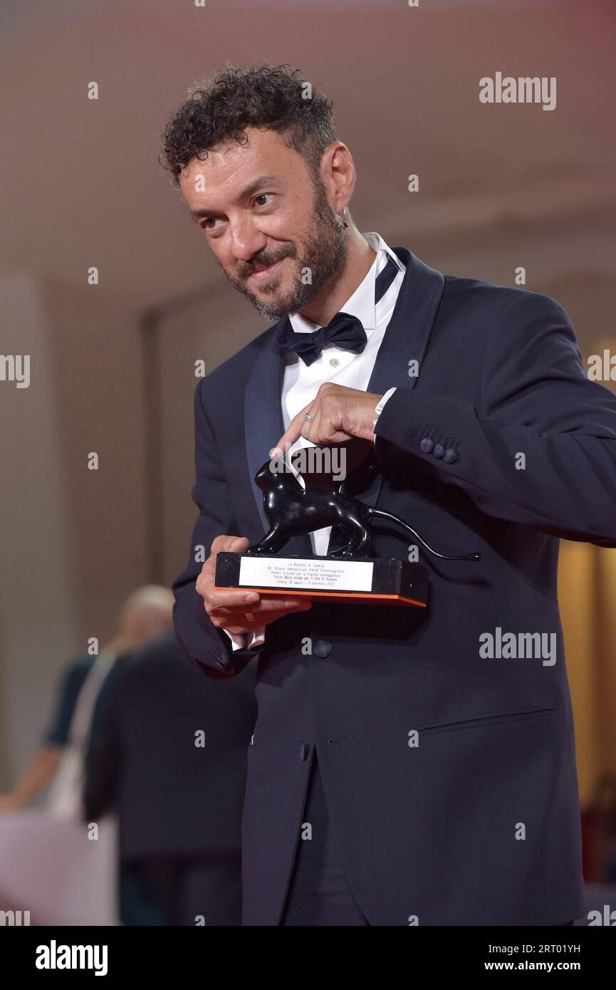 Venezia, Italy. 09th Sep, 2023. Enrico Maria Artale poses with the Best Screenplay Award for film 'El Paraiso' at the winner's photocall at the 80th Venice International Film Festival on Saturday, September 9, 2023 in Venice, Italy. Photo by Rocco Spaziani/UPI Credit: UPI/Alamy Live News Stock Photo