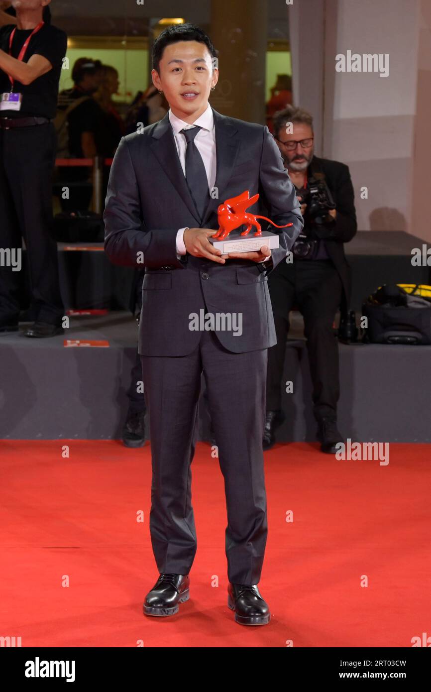Venice Lido, Italy. 09th Sep, 2023. Lee Hong-Chi poses with the Lion of the Future - Luigi De Laurentiis Award for a Debut Film for film 'Love Is A Gun' at the winner's photocall at the 80th Venice International Film Festival. (Photo by Mario Cartelli/SOPA Images/Sipa USA) Credit: Sipa USA/Alamy Live News Stock Photo