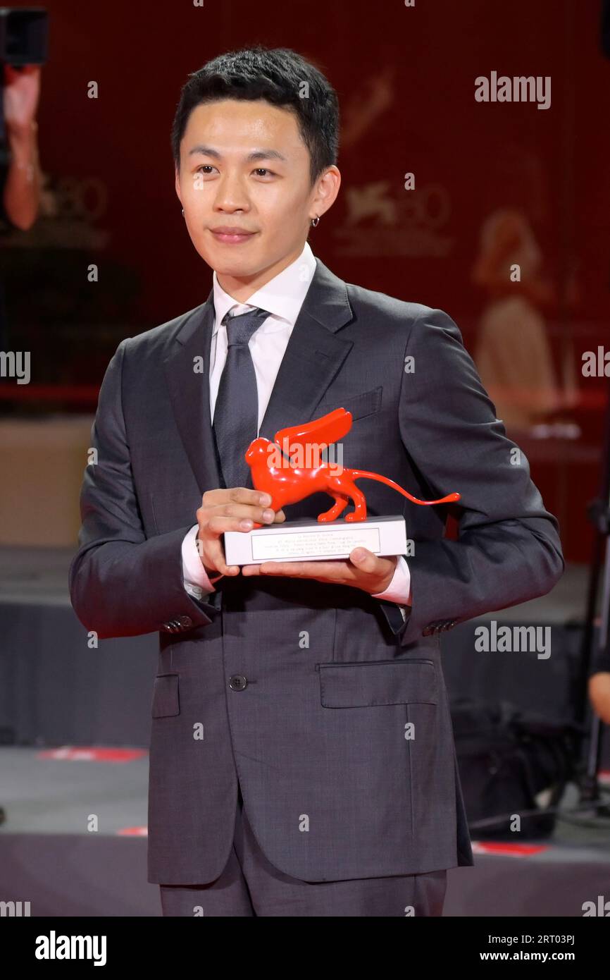 Venice Lido, Italy. 09th Sep, 2023. Lee Hong-Chi poses with the Lion of the Future - Luigi De Laurentiis Award for a Debut Film for film 'Love Is A Gun' at the winner's photocall at the 80th Venice International Film Festival. (Photo by Mario Cartelli/SOPA Images/Sipa USA) Credit: Sipa USA/Alamy Live News Stock Photo