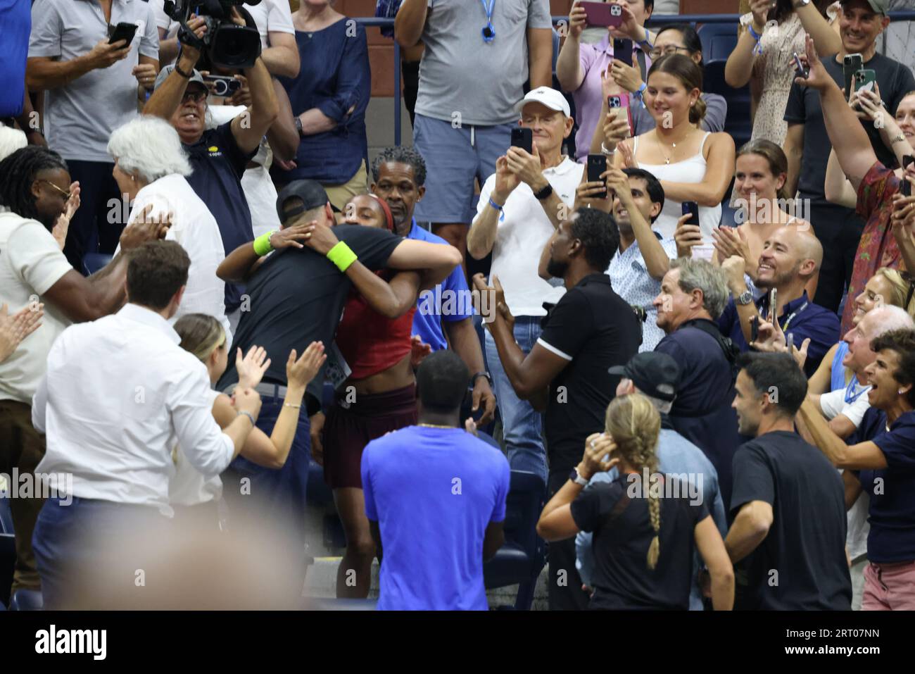 New York, United States. 09th Sep, 2023. Coco Gauff embraces members of her team after defeating Aryna Sabalenka after Gauff won the women's final to claim the US Open title and her first grand slam victory. Credit: Adam Stoltman/Alamy Live News Stock Photo