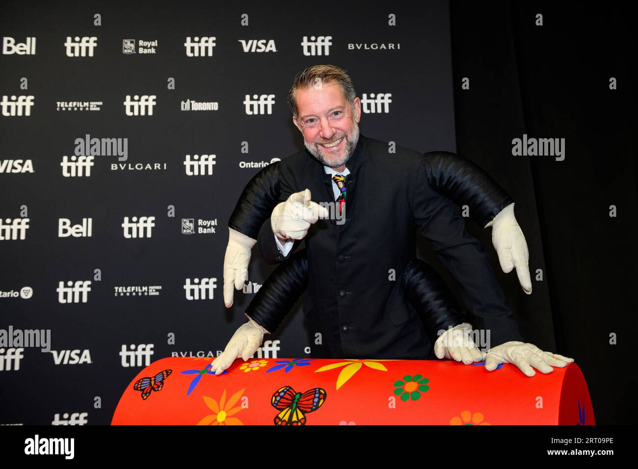 Chris Coombs, son of Ernie Coombs, is photographed on the red carpet