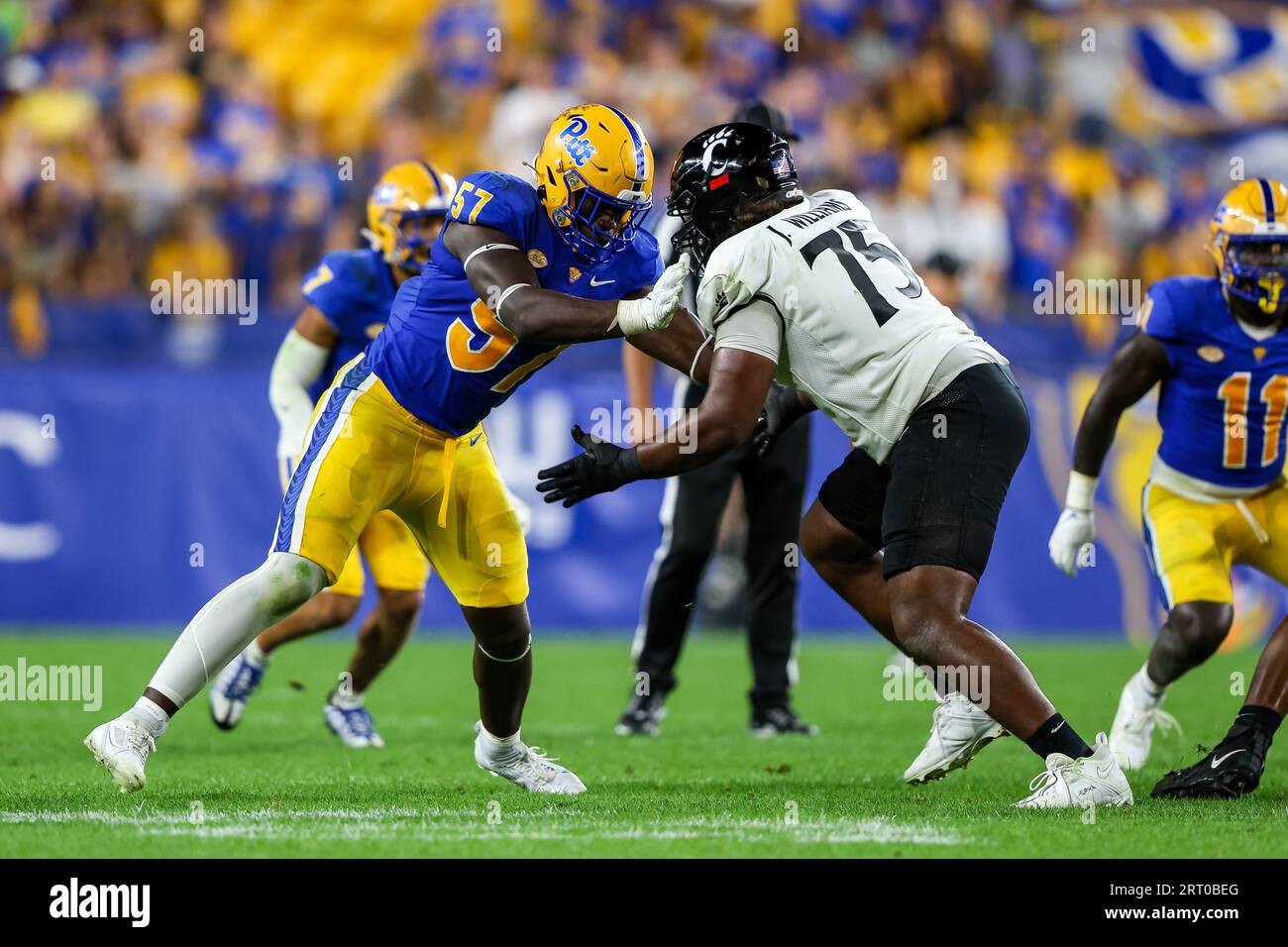 Pittsburgh, Pennsylvania, USA. 09th Sep, 2023. Pitt Panthers defensive end Bam Brima (57) rushes against Cincinnati Bearcats offensive tackle John Williams (75) during the NCAA football game between the Pitt Panthers and the Cincinnati Bearcats at Acrisure Stadium in Pittsburgh, Pennsylvania. Brent Gudenschwager/CSM/Alamy Live News Stock Photo