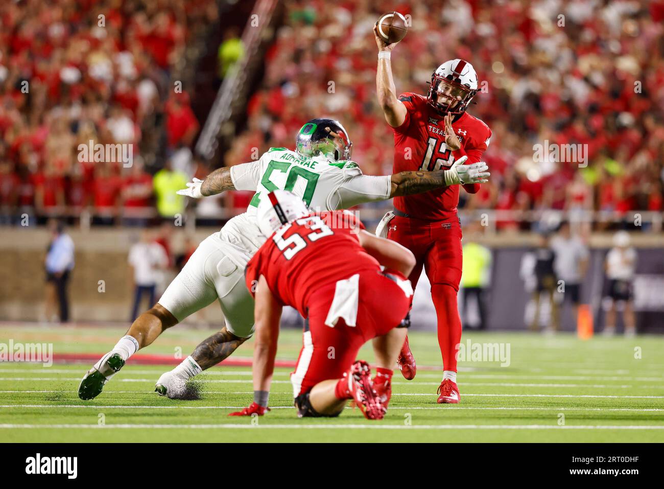 Texas Tech quarterback Tyler Shough (12) is hit as he throws by Oregon ...