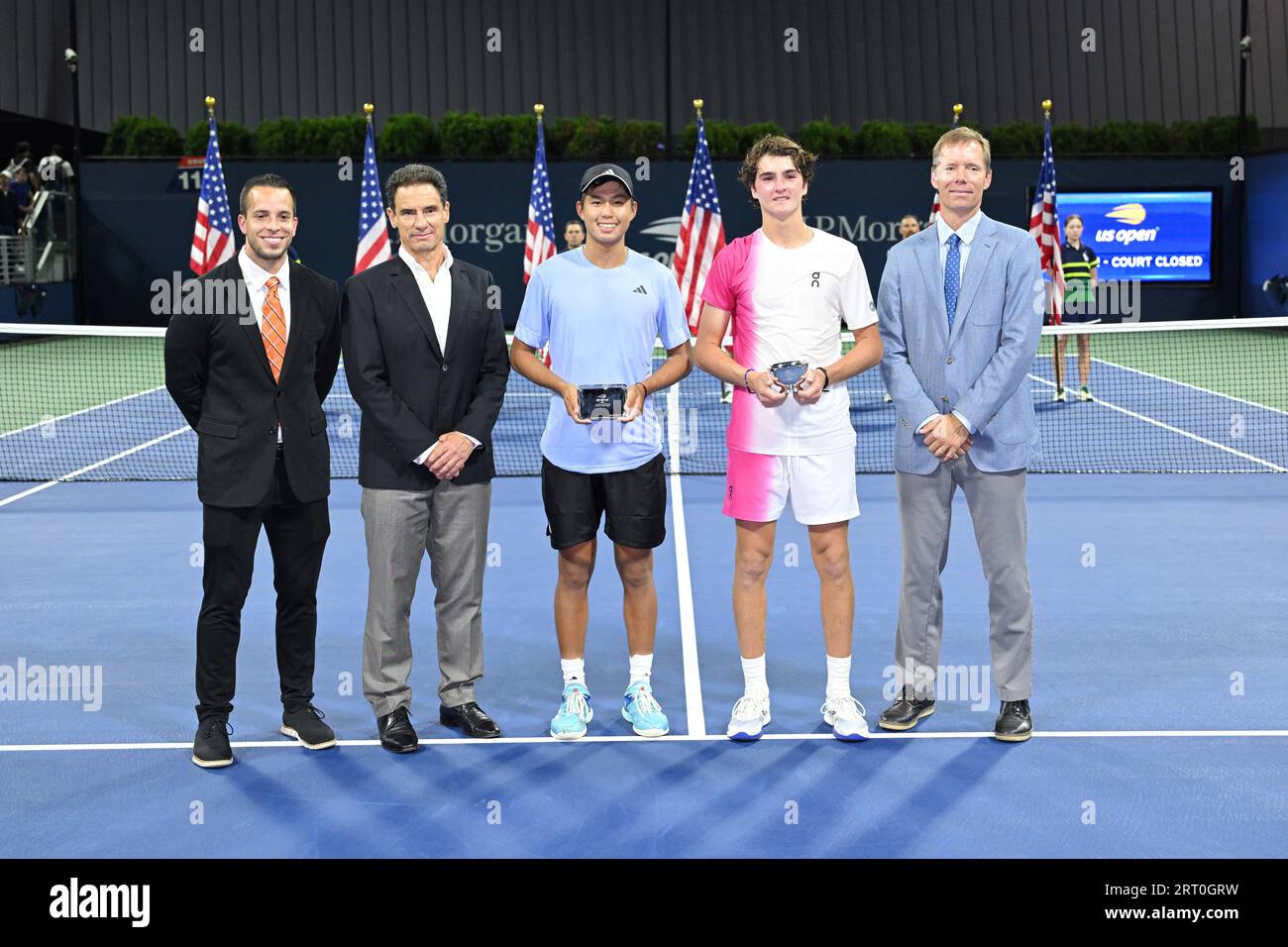 Learner Tien and Joao Fonseca during the trophy presentation after a