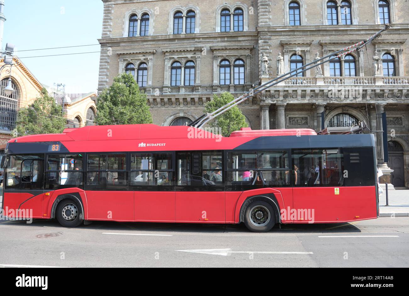Budapest, B, Hungary - August 19, 2023: Red electric trolleybus for the transport of citizens and tourists in the European capital Stock Photo