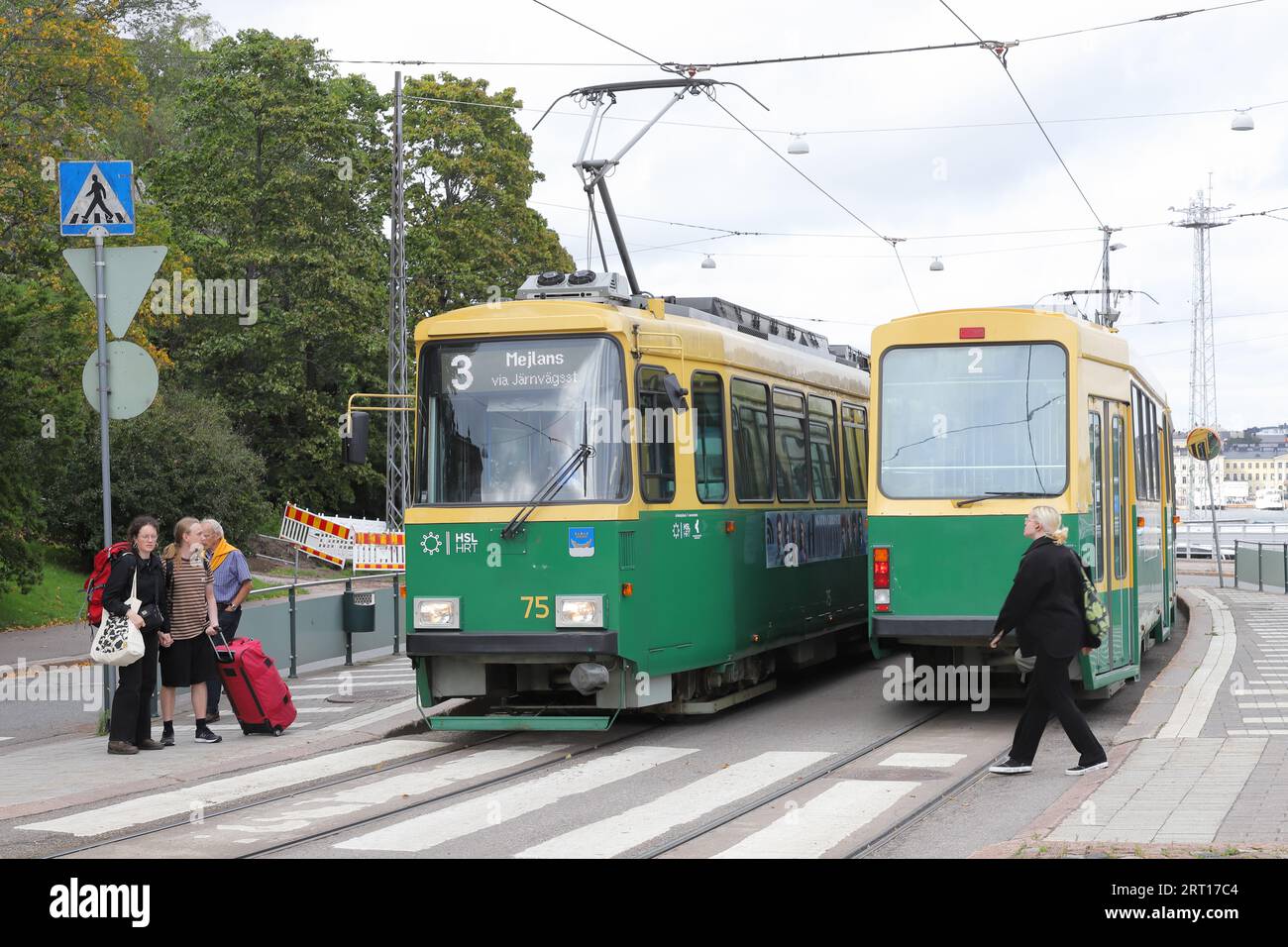 Helsinki, Finland - September 5, 2023: Two trams at the Olympia terminal stop. Stock Photo