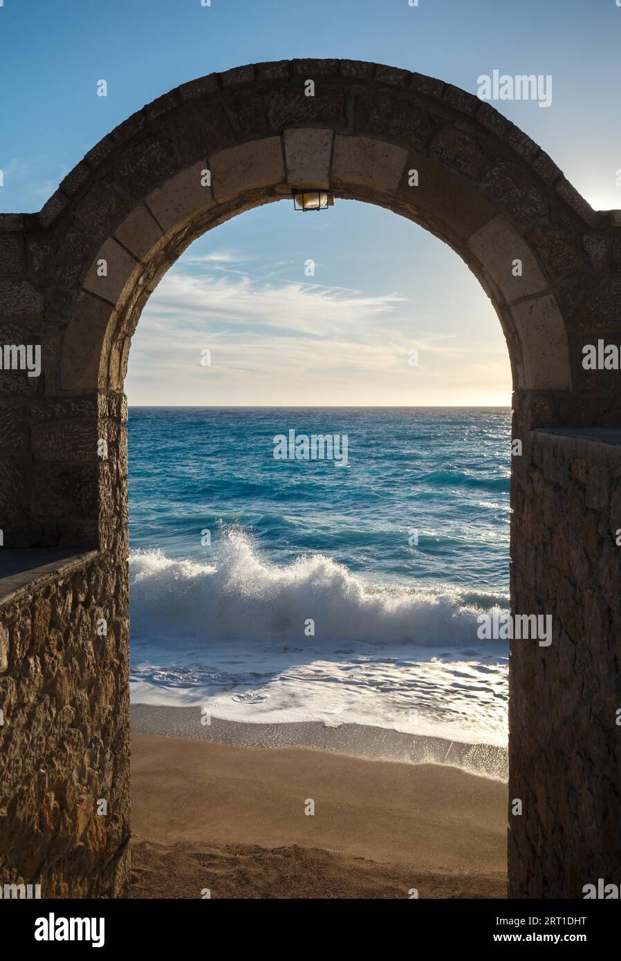 Ionian sea Greece, seashore through the arch door, Kathisma beach Stock Photo