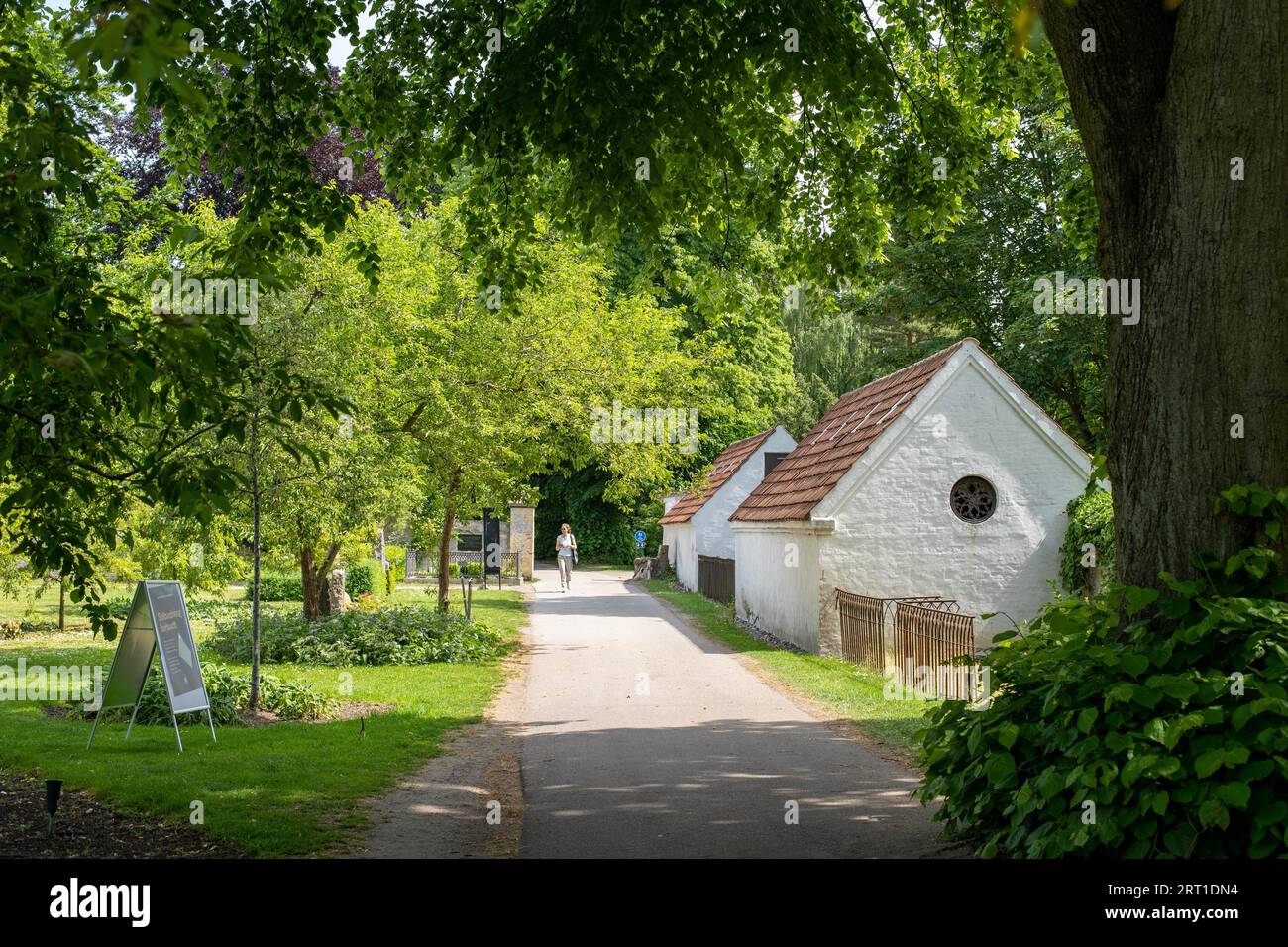 Copenhagen, Denmark, June 10, 2021: White house and walk path on Assistens Cemetery Stock Photo