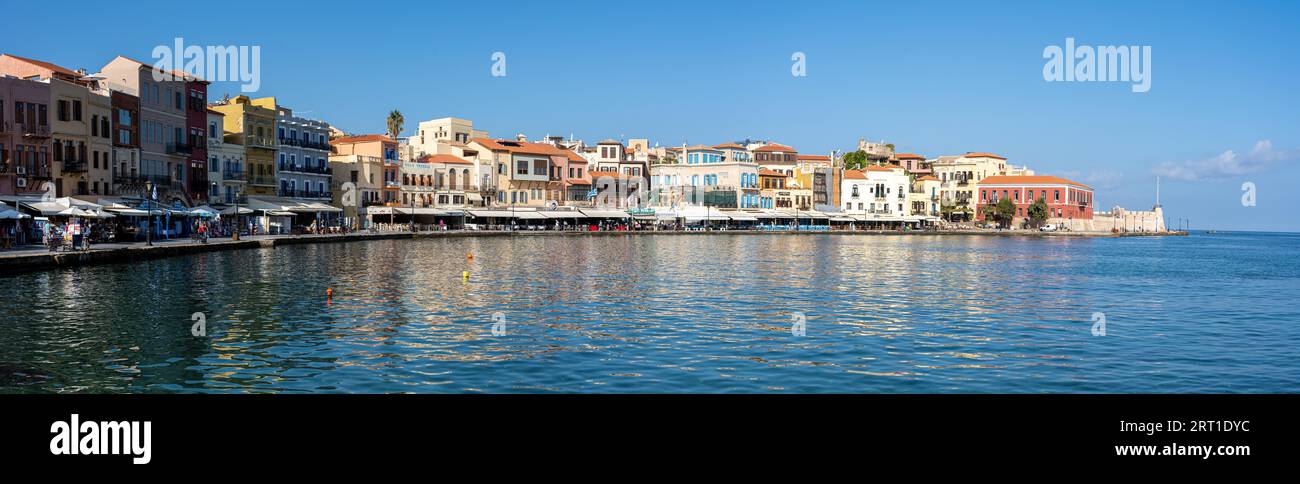 Chania, Greece, September 22, 2021: Historic houses at the old venetian harbour Stock Photo