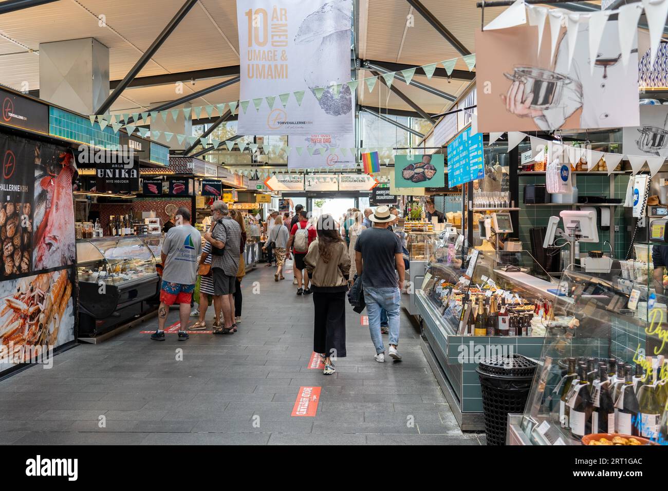 Copenhagen, Denmark, September 03, 2021: People inside Torvehallerne, a popular modern market place Stock Photo