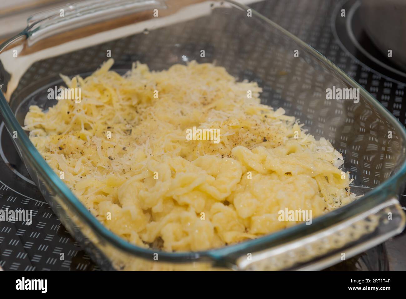 Glass casserole dish with cheese Spaetzle, a south german specialty