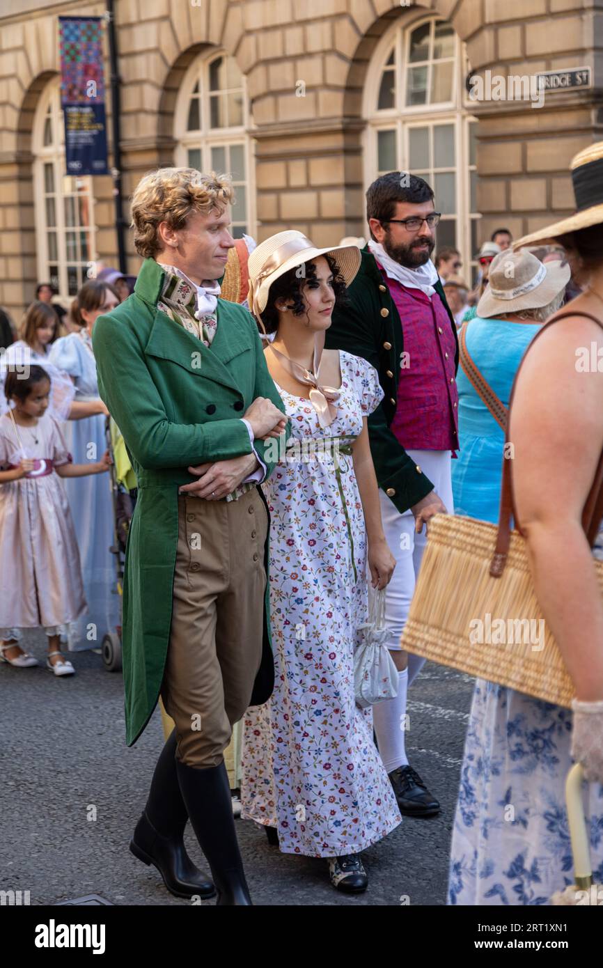 Jane Austen Festival 2023. The Grand Regency Promenade where people from around the world join the official opening procession of the festival.Bath Stock Photo
