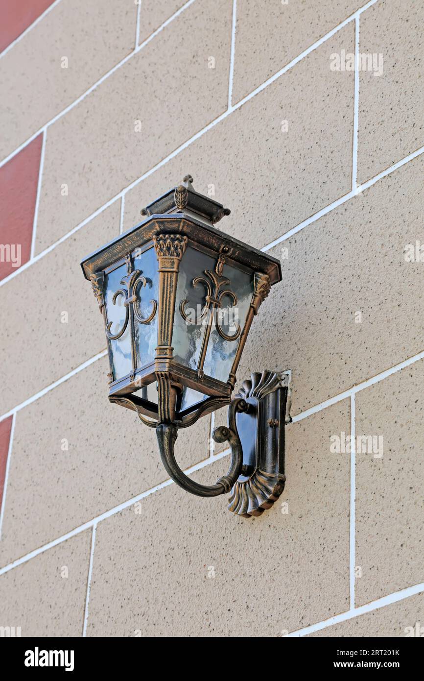 European lighting facilities on the gray wall Stock Photo Alamy