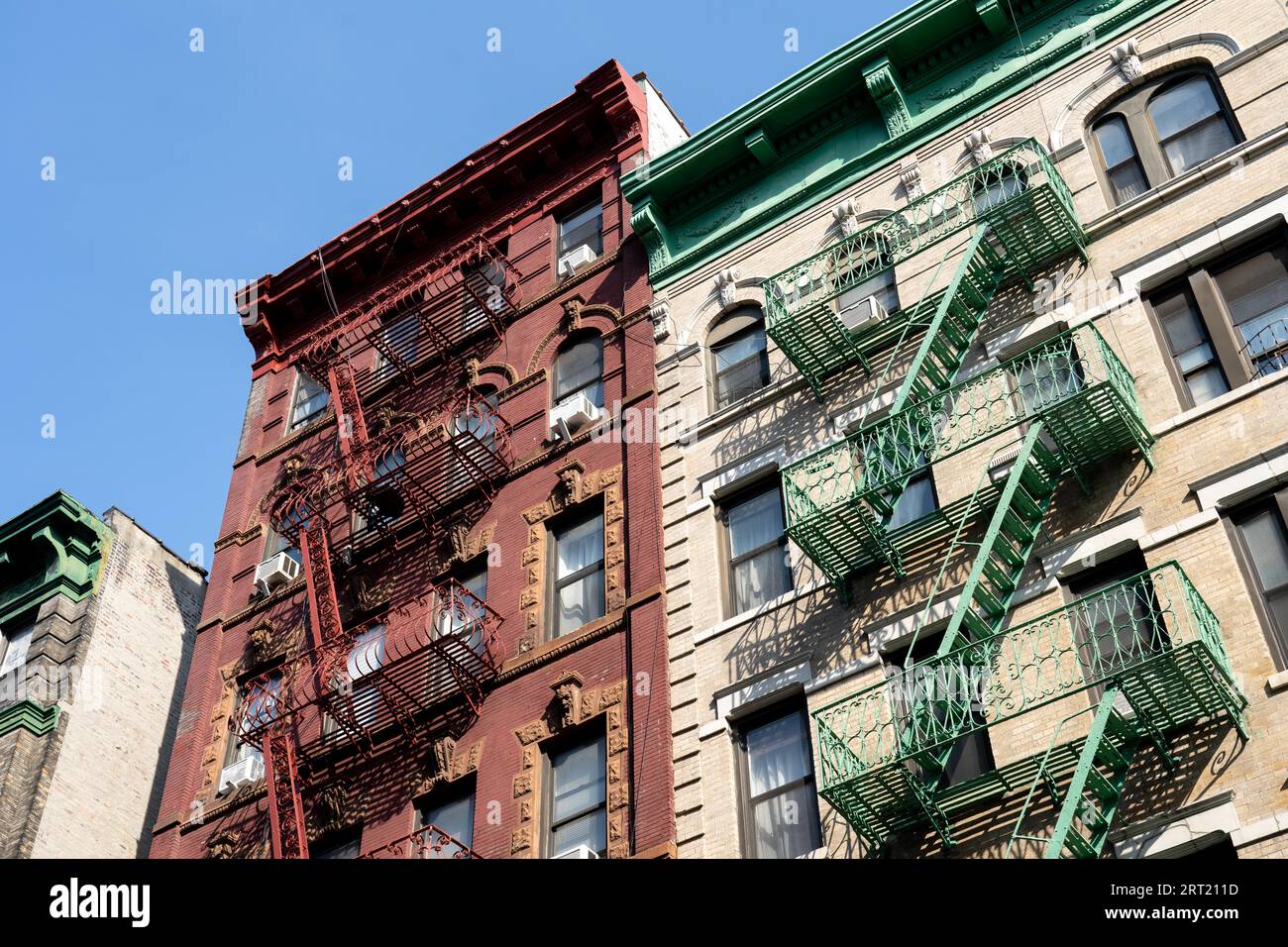 New York, United States of America, September 22, 2019: Residential Buildings with typical fire escapes in Manhatten Stock Photo