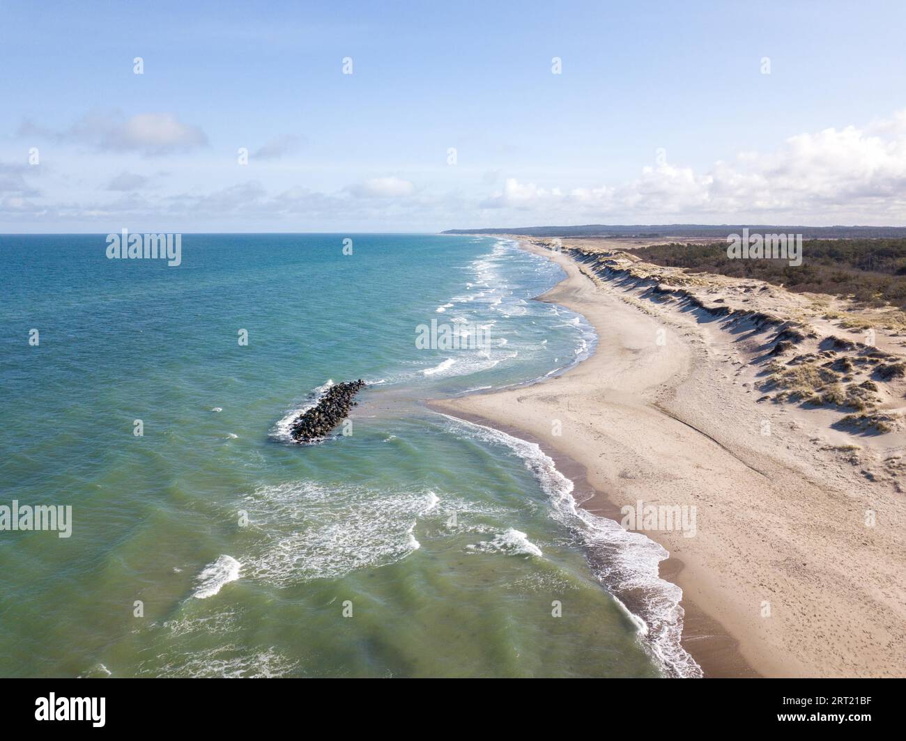 Liseleje, Denmark, April 4, 2020: Aerial drone view of a breakwater at Liseleje Beach Stock Photo