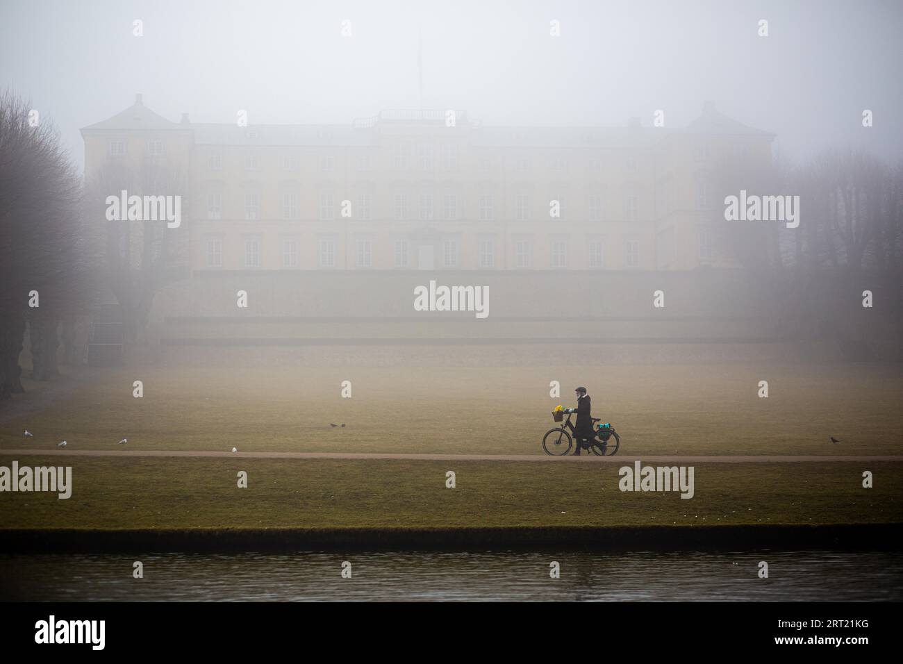 Copenhagen, Denmark, March 3, 2021: People on a foggy day in Frederiksberg Gardens Stock Photo