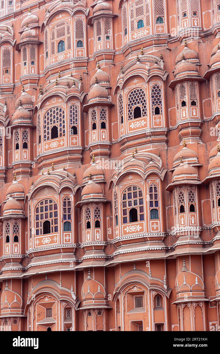 Jaipur, India, December 11, 2019: Beautiful windows of the Hawa Mahal, Palace of Winds in the pink city Stock Photo