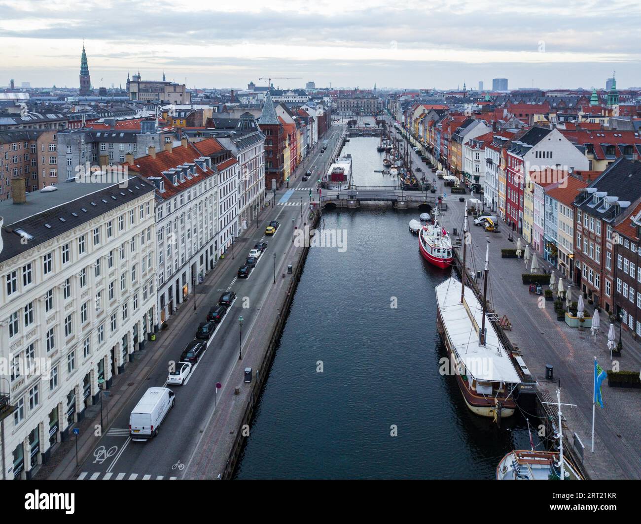 Copenhagen, Denmark, April 07, 2020: Aerial drone view of the famous Nyhavn district in the historic city centre Stock Photo