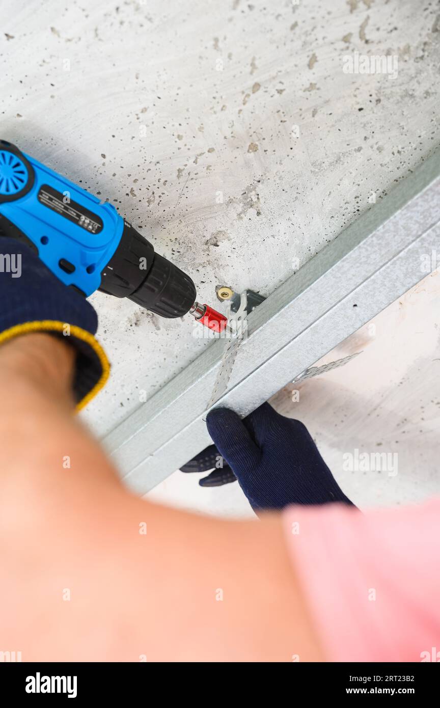 Ceiling drill hi res stock photography and images Page 2 Alamy