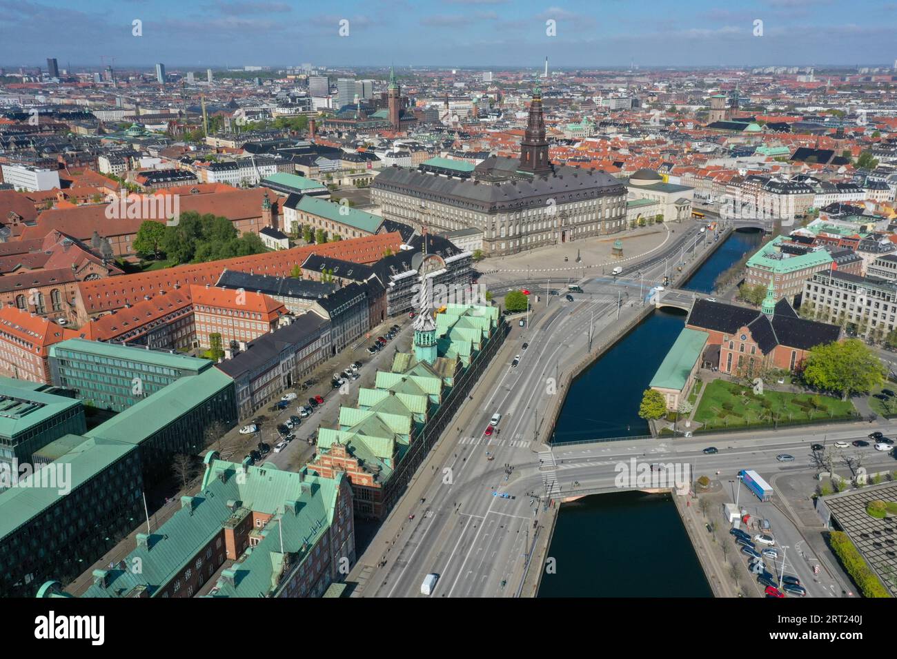 Copenhagen, Denmark, May 07, 2020: Aerial drone view of Christiansborg Palace and the former stock exchange building Stock Photo