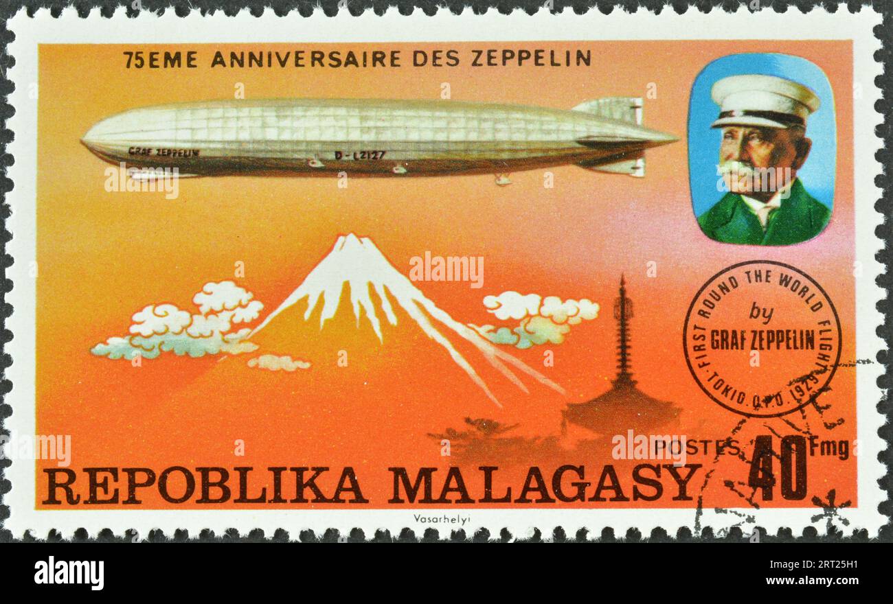 Cancelled postage stamp printed by Grenada, that celebrates 75th anniversary of first zeppelin flight, circa 1977. Stock Photo