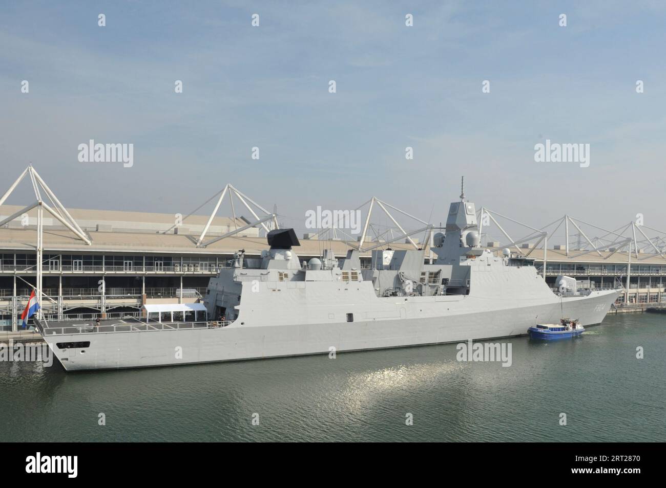 London, UK - 10 September 2023 - HNLMS De Ruyter, a De Zeven Provinciën-class frigate of the Royal Netherlands Navy, moored in Royal Victoria, Dock, London, UK.  HNLMS De Ruyter is one of the visiting ships that feature in the Defence and Security Equipment International (DSEI) show which opens to visitors tomorrow.  The frigate is named after Dutch admiral Michiel de Ruyter (1607–1676).  The trade exhibition serves as a forum between governments, national armed forces, industry, and academics as well as an arms trade showcase and is held biennially at ExCel London, UK. Stock Photo