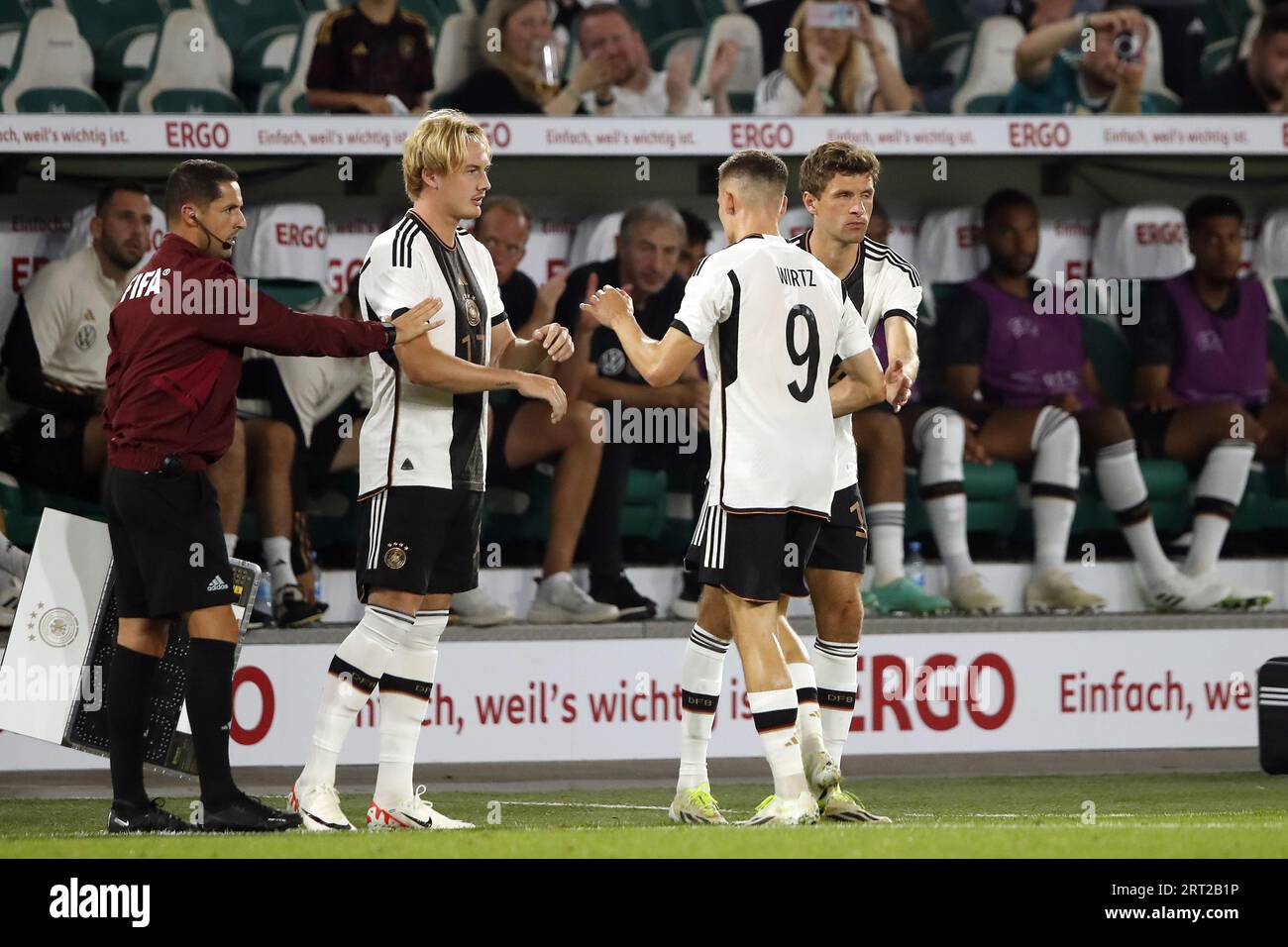 WOLFSBURG - (l-r) Julian Brandt of Germany, Florian Wirtz of Germany, Thomas Muller of Germany during the friendly Interland match between Germany and Japan at the Volkswagen Arena on September 9, 2023 in Wolfsburg, Germany. ANP | Hollandse Hoogte | BART STOUTJESDIJK Stock Photo