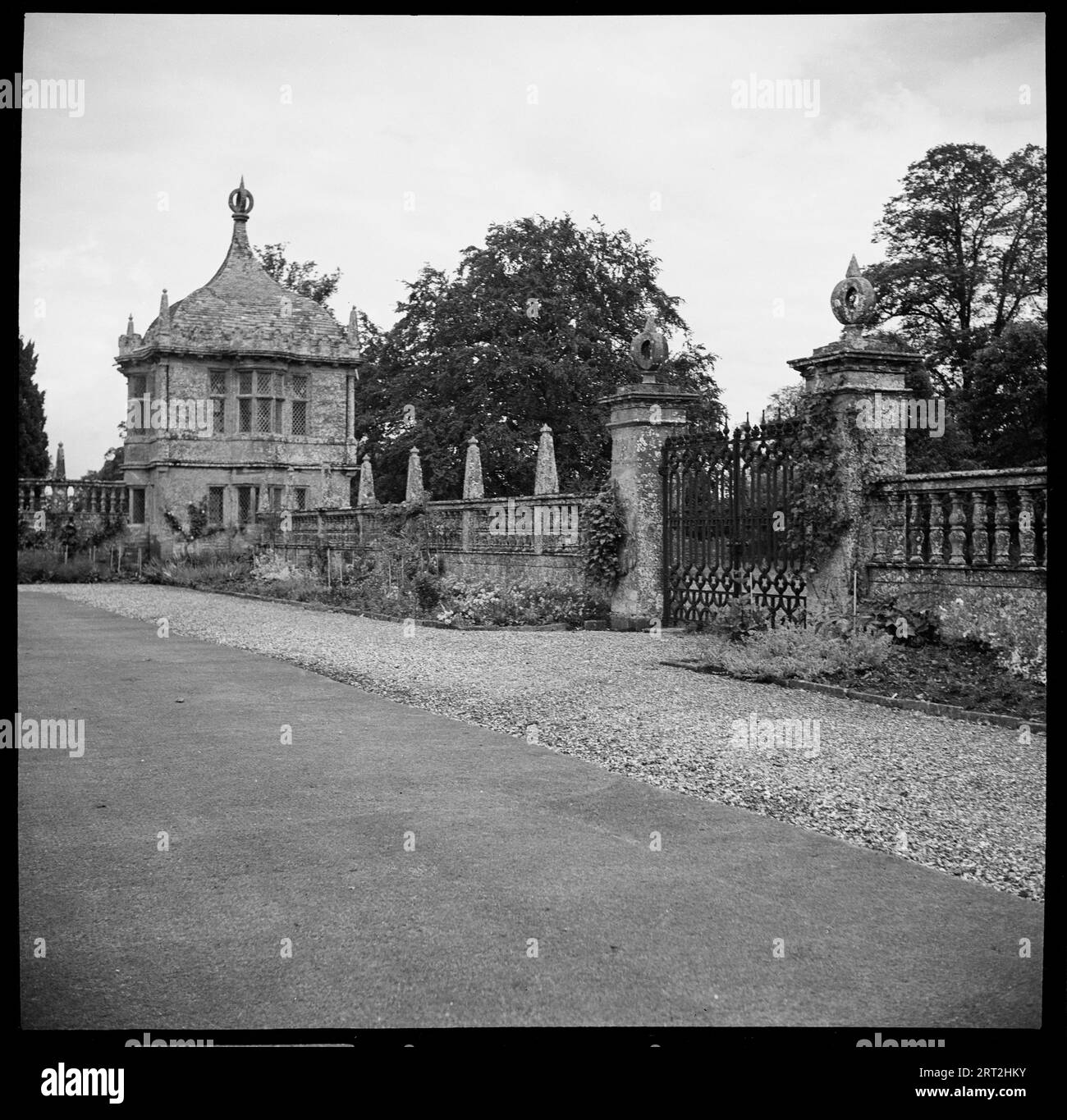Montacute House, Montacute, South Somerset, Somerset, 1938. The walls, gateway and north-east garden pavilion in the east forecourt of Montacute House. Stock Photo