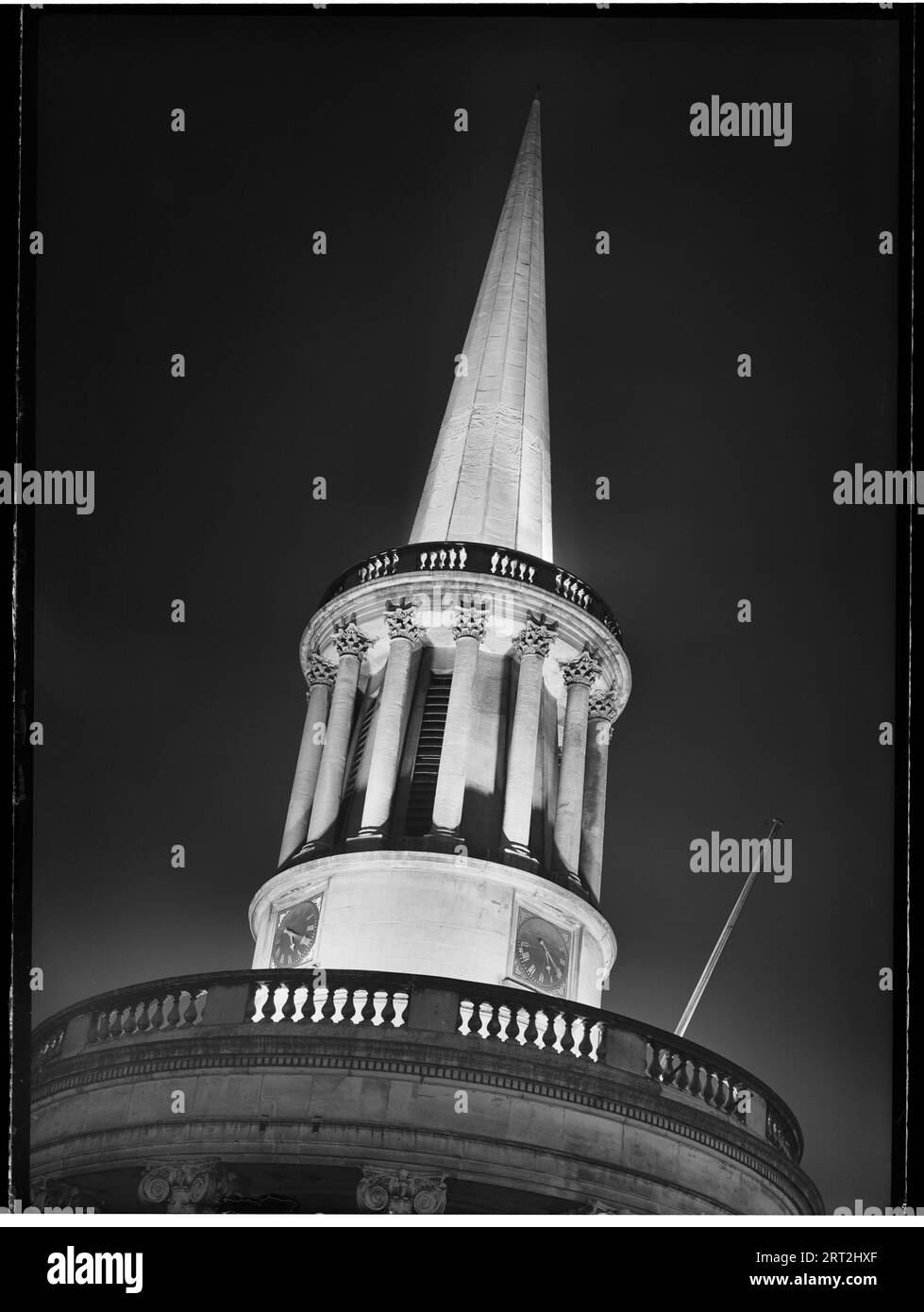 All Souls Church, Langham Place, Marylebone, City of Westminster, Greater London Authority, 1950. Looking up towards the church's restored spire, floodlit at night, from the south-east. Stock Photo