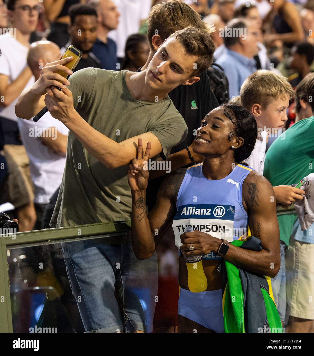 He Rah Elaine Thompson-Herah of Jamaica signing autographs for fans after ...
