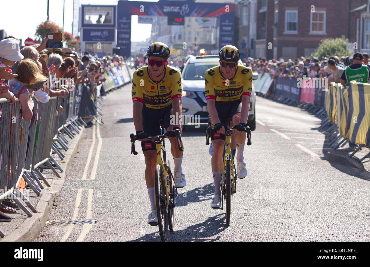 Tour of Britain cycling stage 5 at Felixstowe 2023. Edoardo Affini and Nathan Van Hooydonck of team Jumbo-Visma finish the race together. Stock Photo