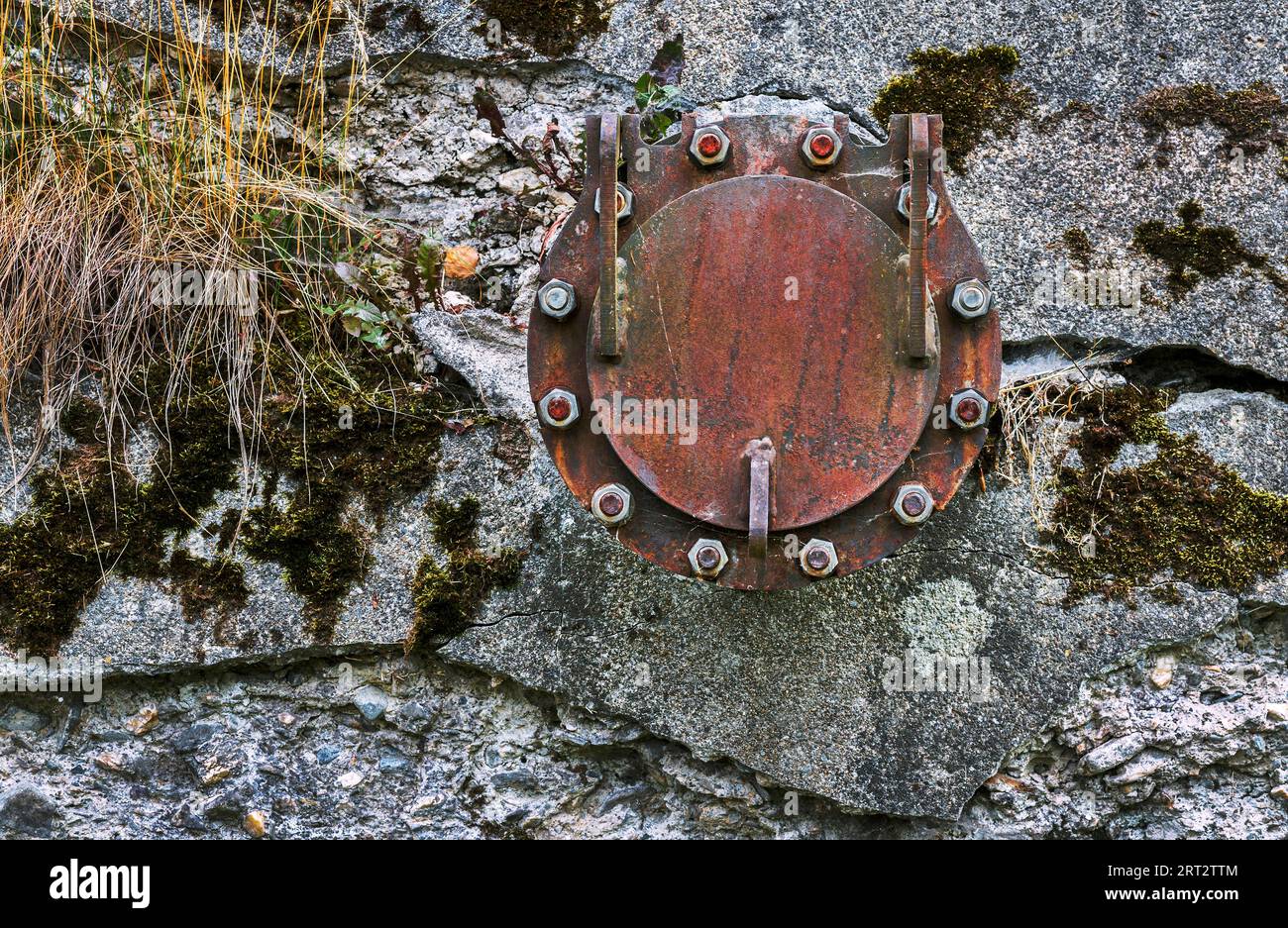 The flange on the old wall Stock Photo