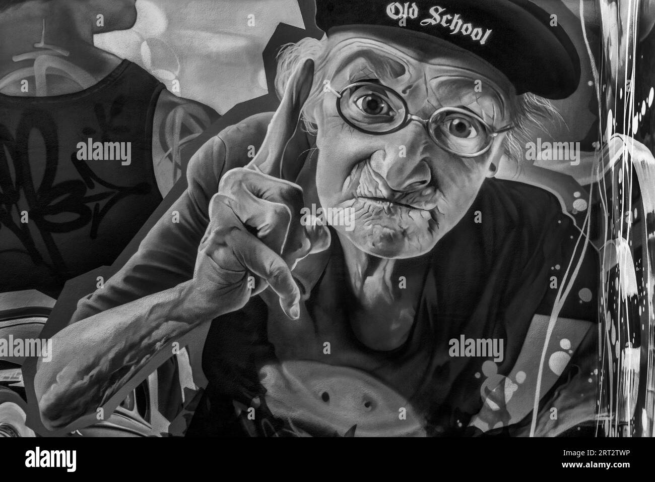 Graffito man with raised hand now pay attention stock photo alamy
