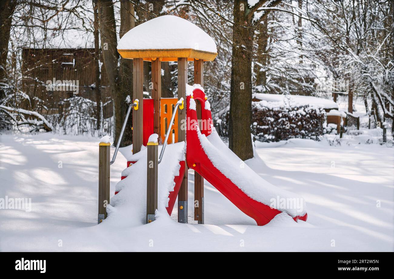 Children's playground in winter Stock Photo - Alamy