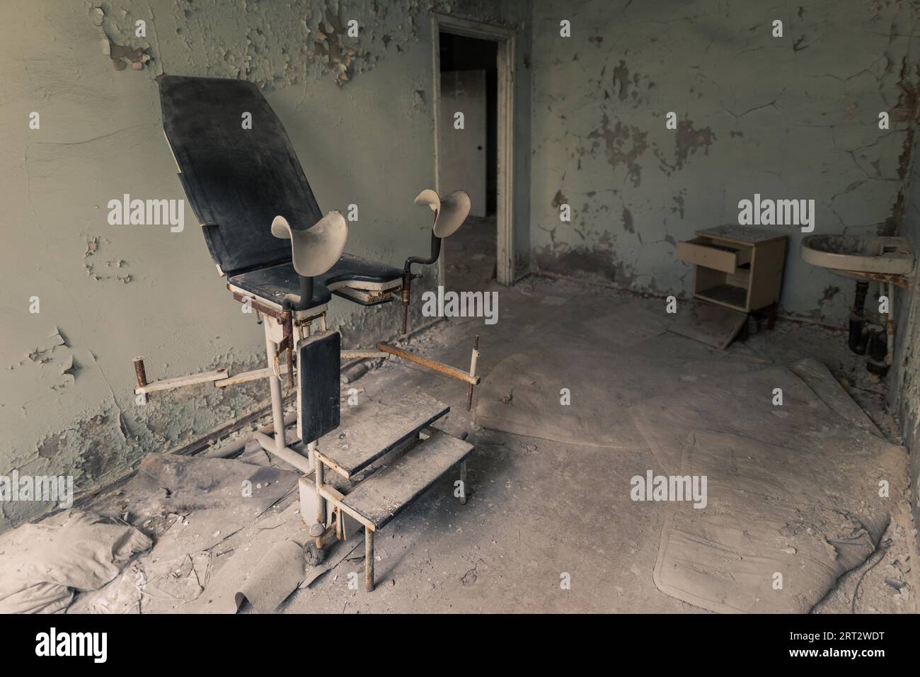 Gynecological chair in operating room in abandoned hospital in Pripyat ...