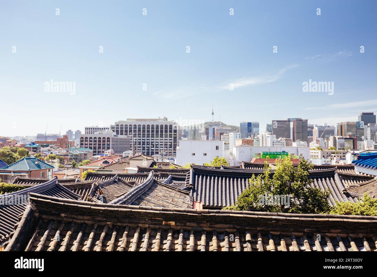 A view across rooftops in Bukchon Hanok Village. This area is a Korean ...