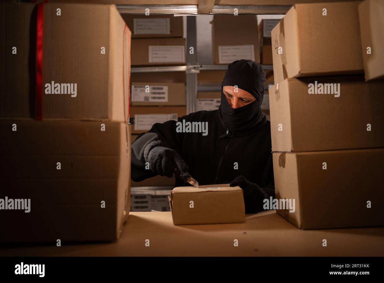 Stealing parcels and damaging the packaging of goods in the warehouse
