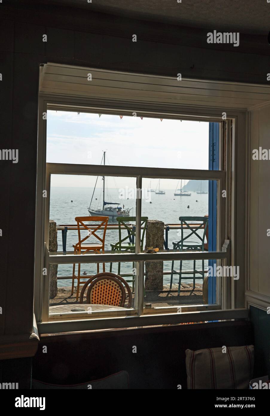 View of Cawsand Bay through a pub window on the Cleeve in Kingsand
