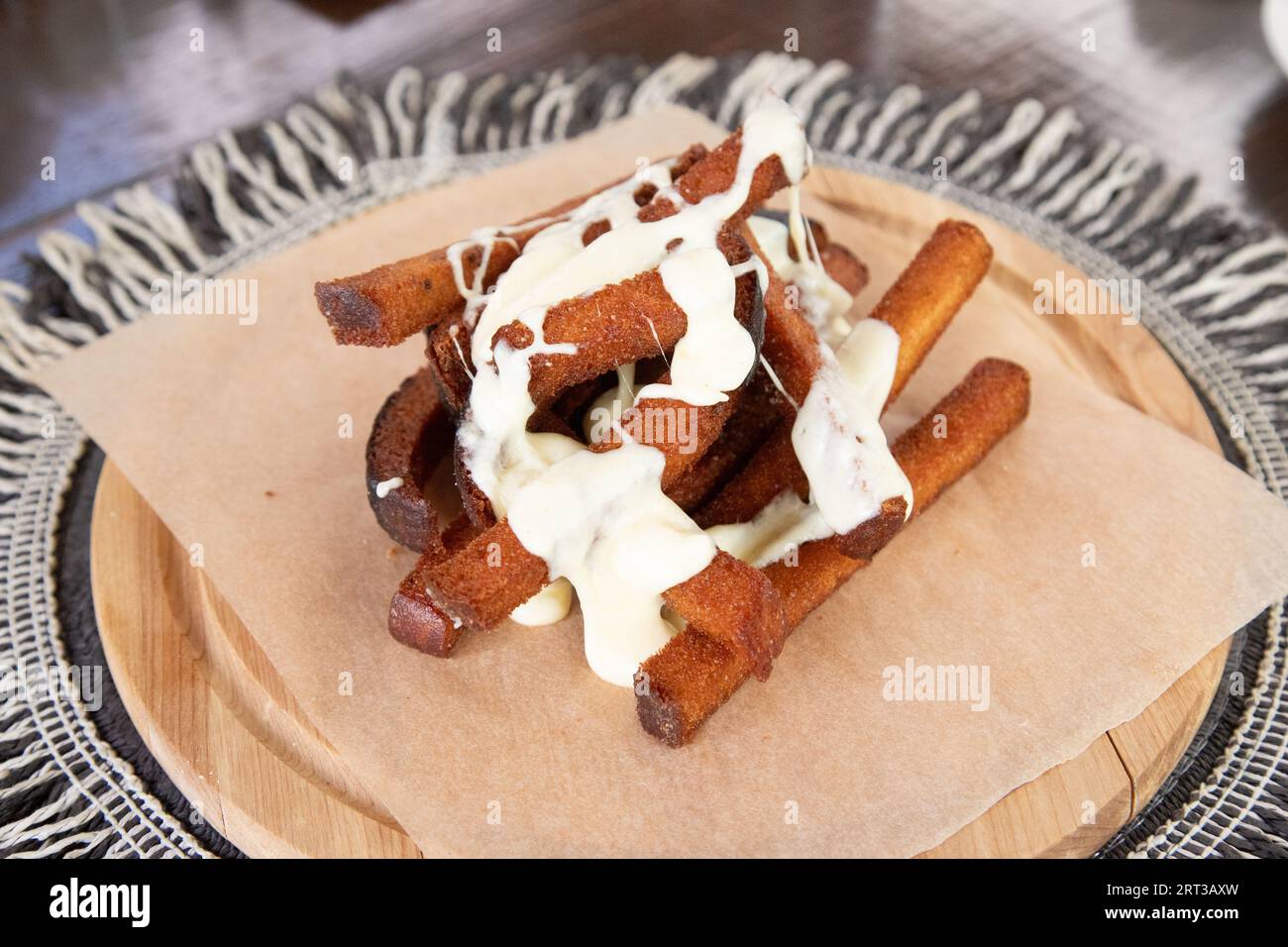 A serving of Lithuanian fried bread with cheese - a common snack and starter found in the country Stock Photo
