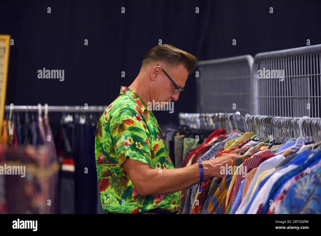 Calafell, Spain. 09th Sep, 2023. A man observes Rockabilly aesthetic shirts  in a clothing store during the High Rock-A-Billy Festival in Calafell. From  September 7 to 10, 2023, the High Roc-A-Billy Festival