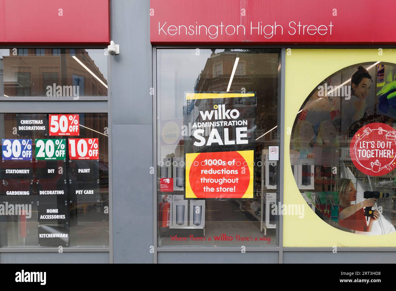 Wilko store at Kenginston High Street start clearance sale. Many shelves have already been emptied, whilst other products are offered on massive price Stock Photo