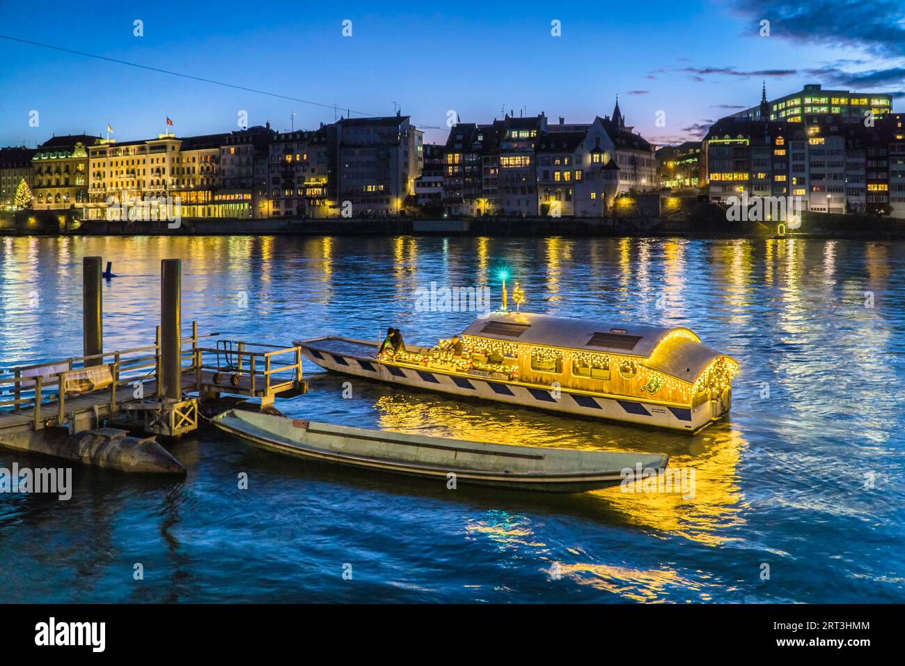 The Klingental ferry illuminated for Christmas: Vogel Gryff. One of the ferries in Basel, the beautiful city on the bend of the Rhine Stock Photo