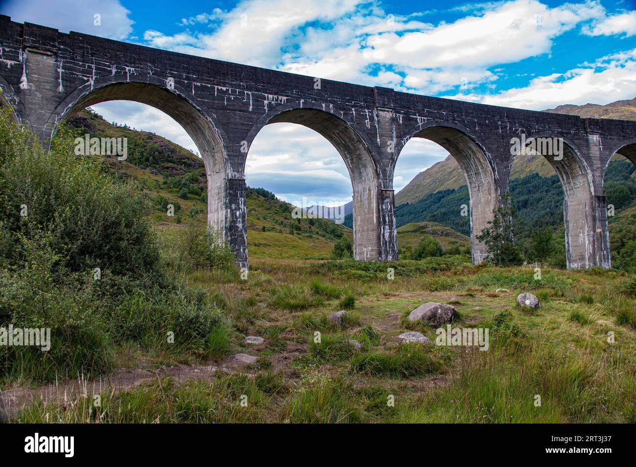 Glenfinnan Viaduct, iconic 1901 railway with a curving, 21-arch span, featured in several Harry Potter movies, Glenfinnan, West Highlands, Scotland Stock Photo