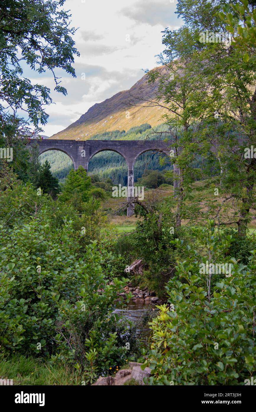 Glenfinnan Viaduct, iconic 1901 railway with a curving, 21-arch span, featured in several Harry Potter movies, Glenfinnan, West Highlands, Scotland Stock Photo