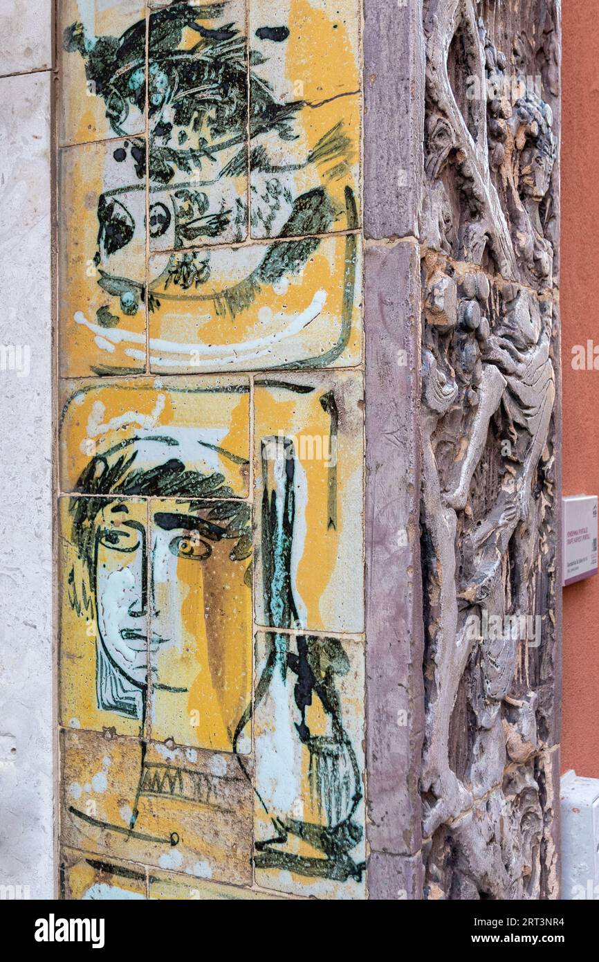 Close-up of a wall decorated with artistic ceramic tiles in the historic centre of Albissola Marina, Savona, Liguria, Italy Stock Photo