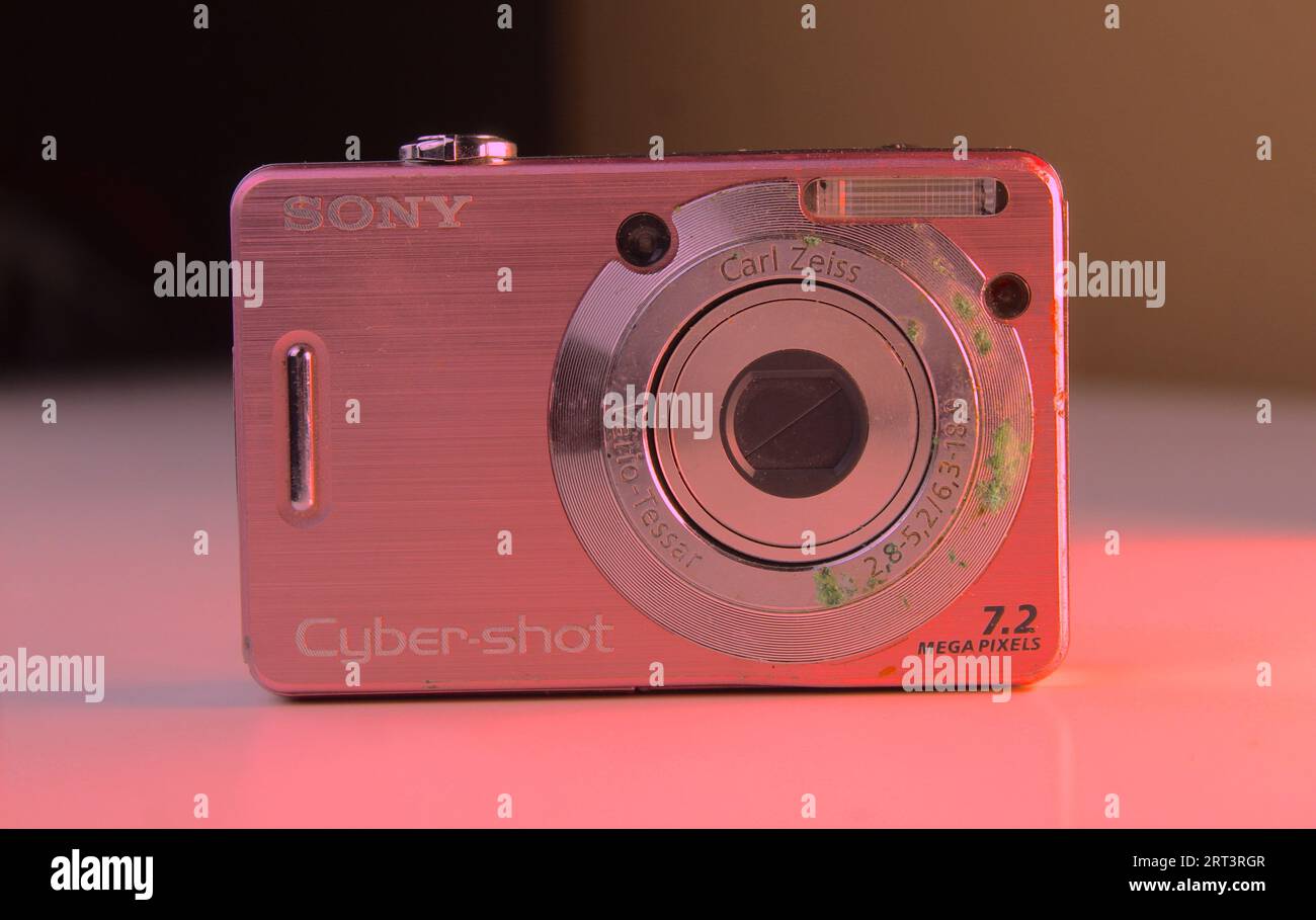A photo of a small pink Sony Cyber Shot camera. Stock Photo