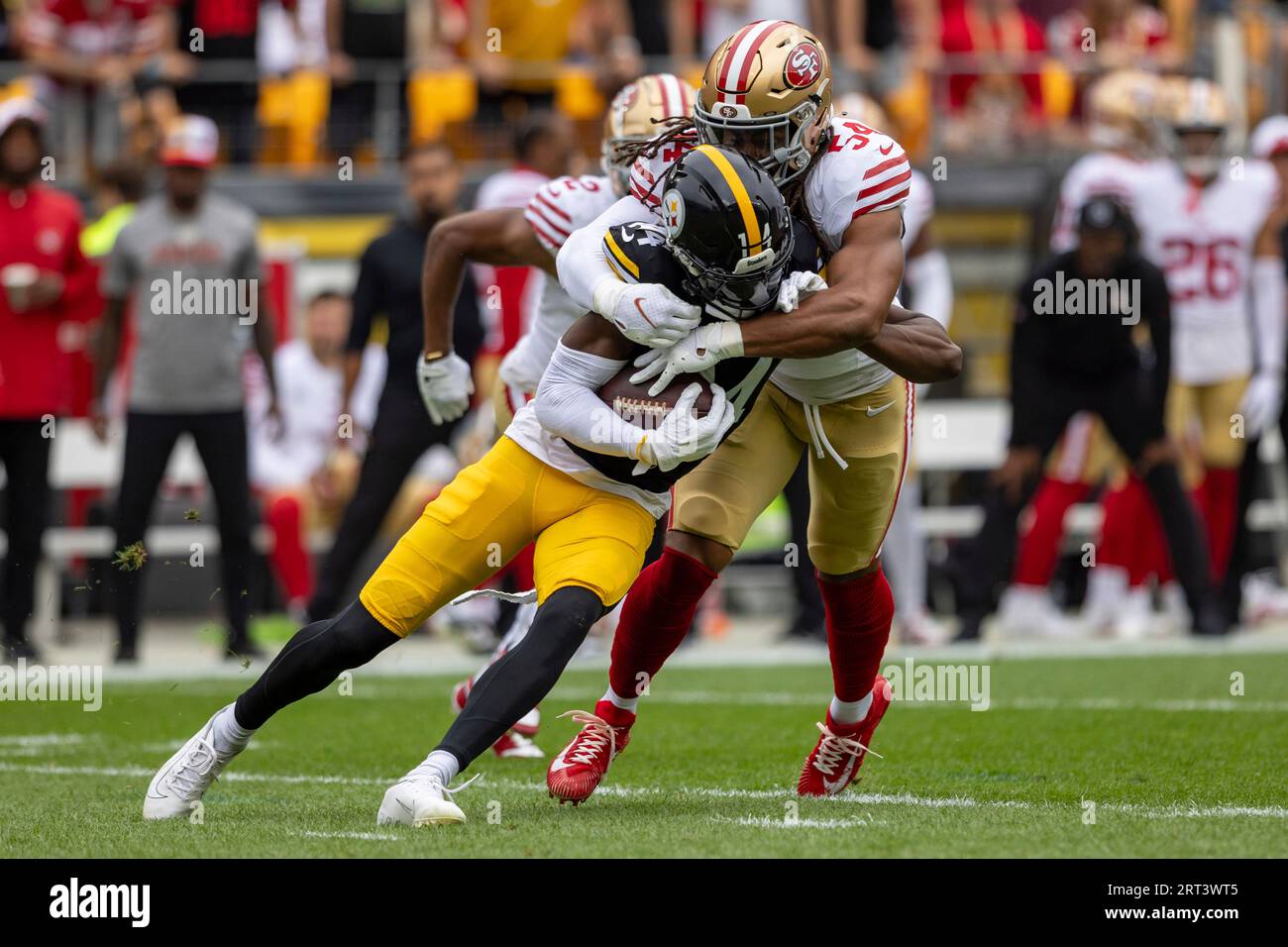 Pittsburgh Steelers wide receiver George Pickens (14) is tackled by San  Francisco 49ers linebacker Fred Warner (54) during an NFL football game,  Sunday, Sept. 10, 2023, in Pittsburgh. (AP Photo/Matt Durisko Stock Photo -  Alamy