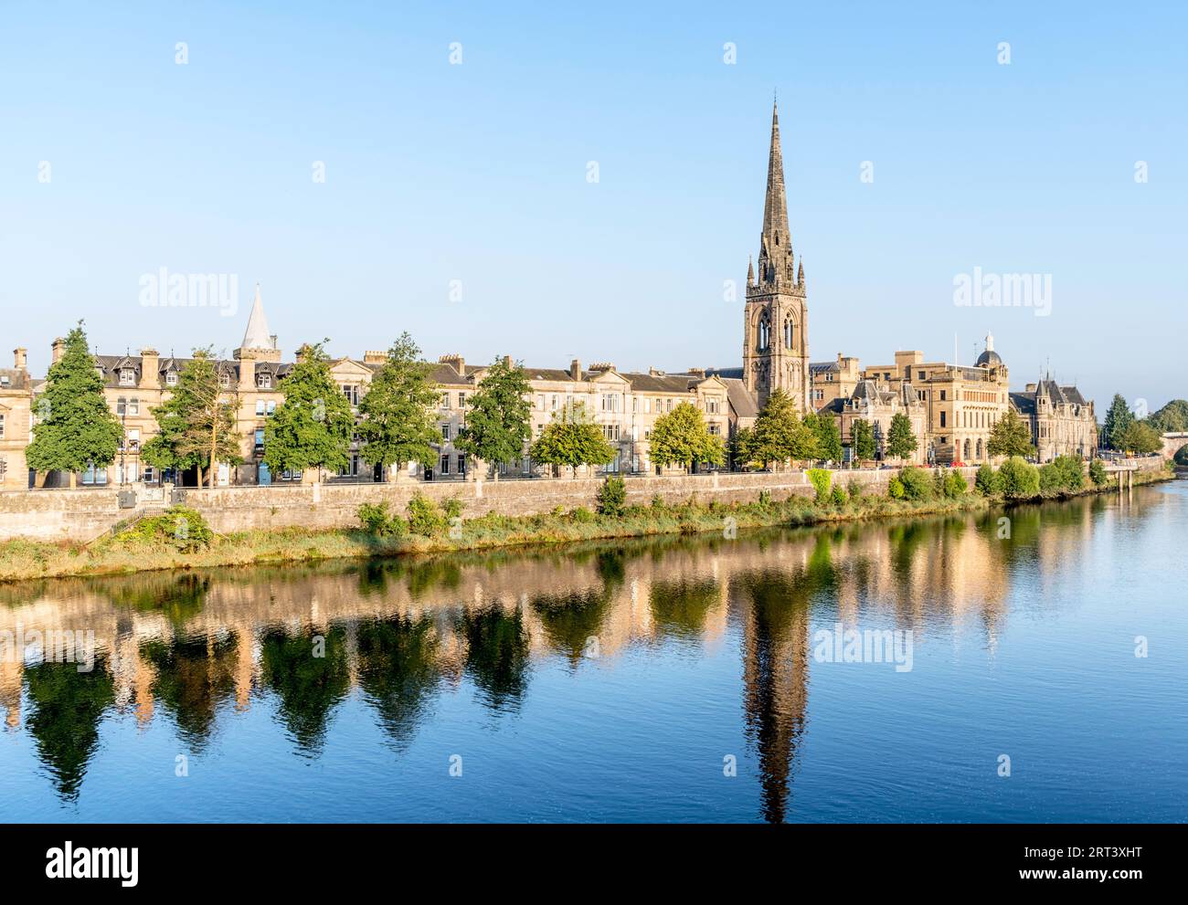 Buildings reflected in the river Tay in Perth, Scotland, UK Stock Photo