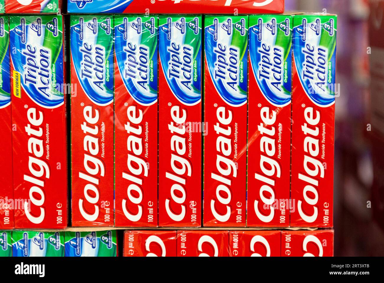Bulk packages of Colgate Triple Action toothpaste at Costco Stock Photo